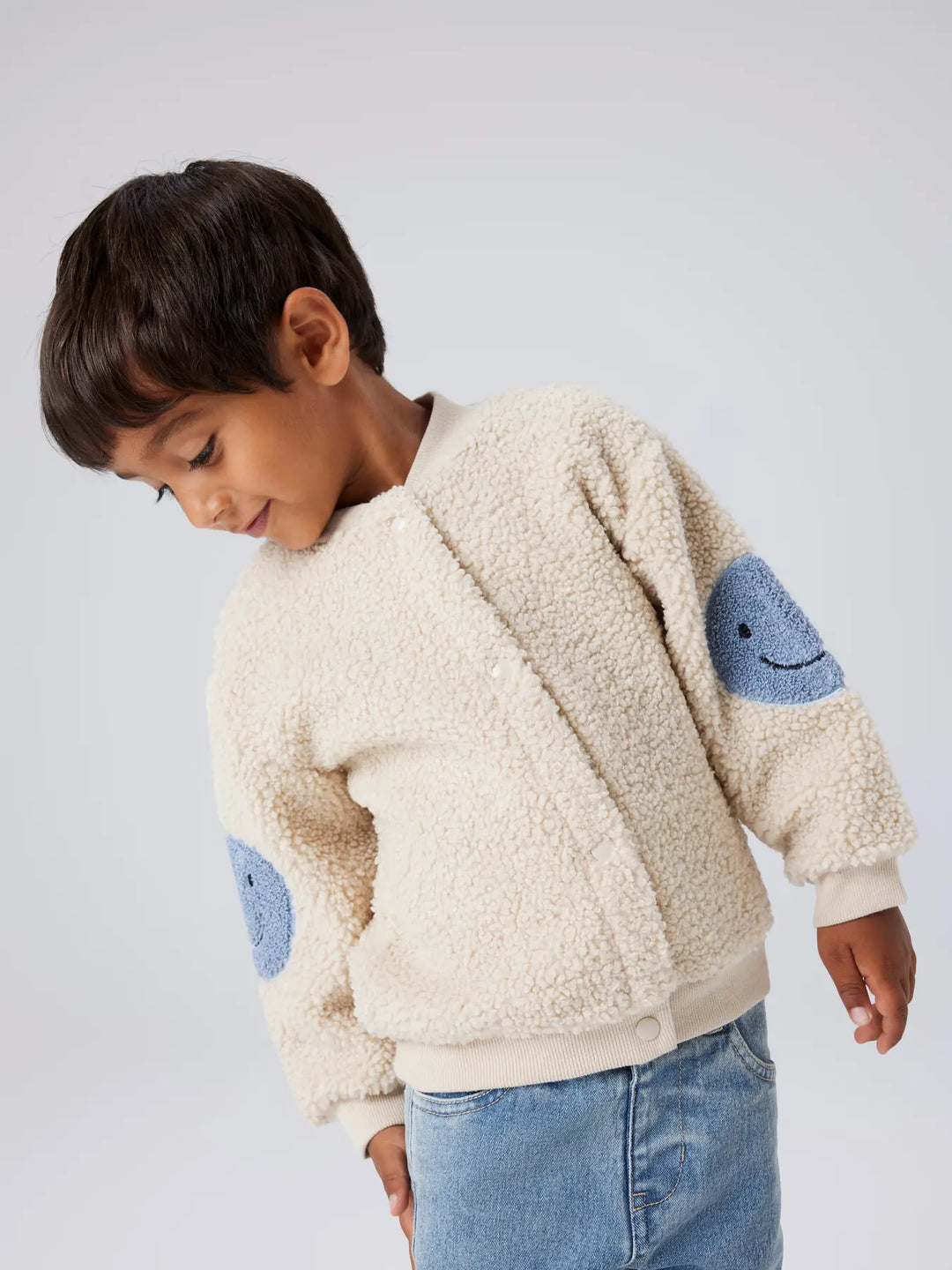 Teddy jasje smiley peyote blauw