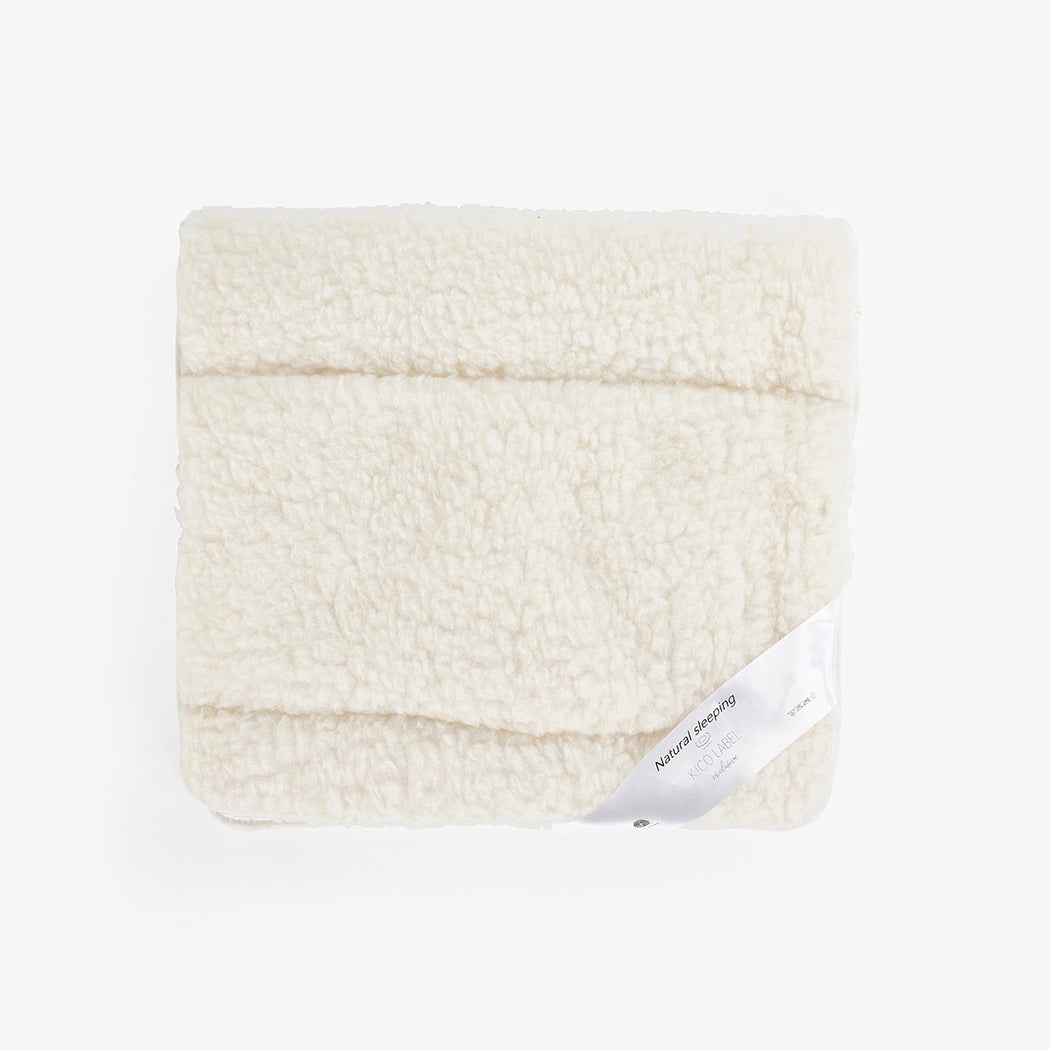 Wollen matrastopper onderdeken